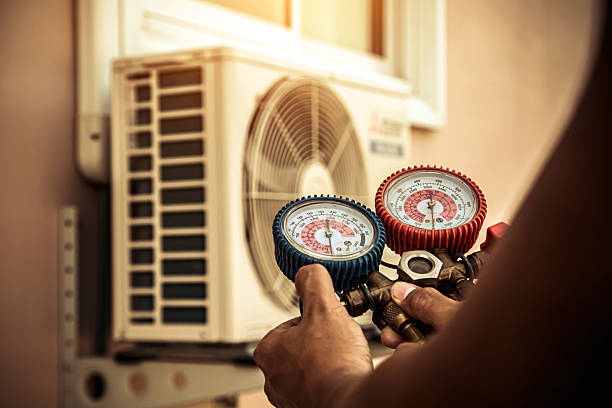 Professional Hvac technician working in Odenville, AL